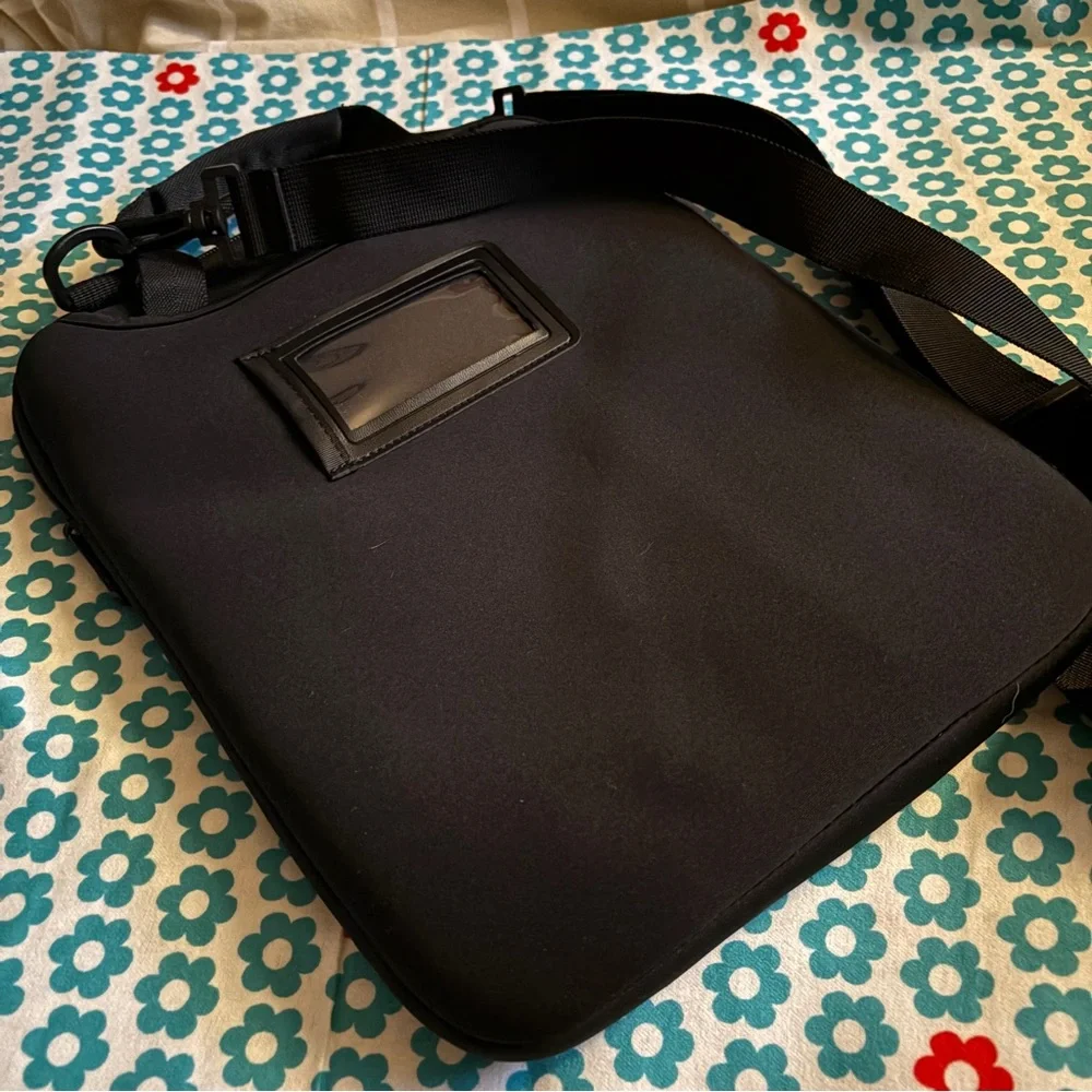Targus Black Vertical Laptop Slipcase with Adjustable Shoulder Strap (new)